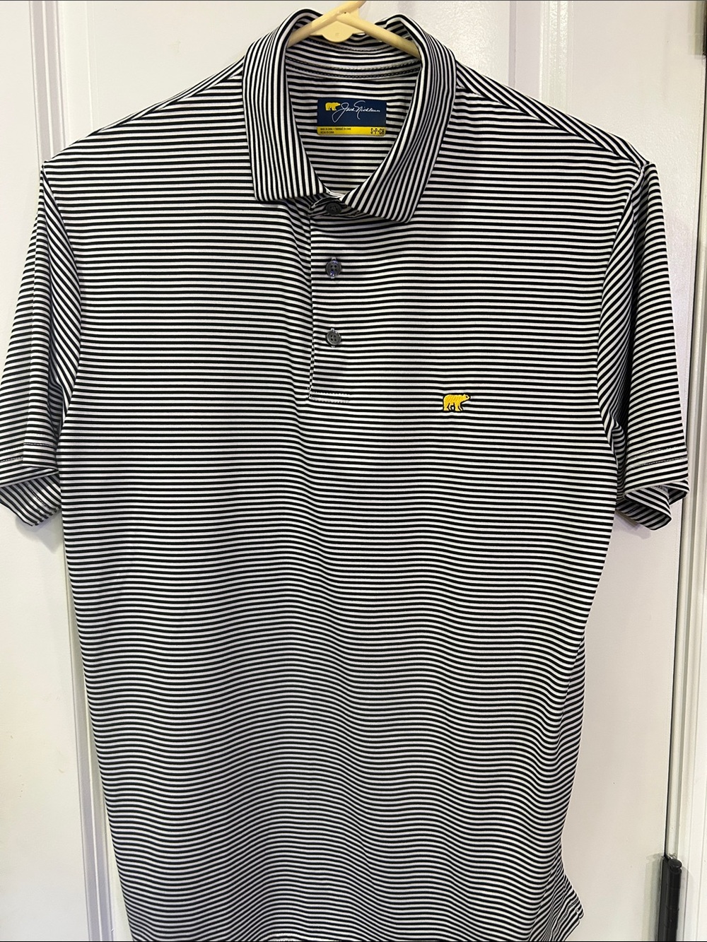 Striped Black & White Polo with Yellow Bear Accent